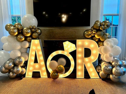 Custom wedding marquee sign: lighted engagement ring decor