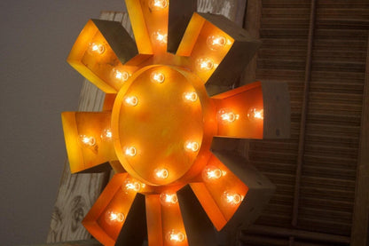 Vintage style metal sun marquee light, weathered finish
