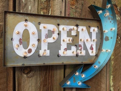 Custom metal open marquee sign with arrow – lighted business sign